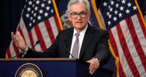 US stocks end mixed as Fed rate cut sparks volatility