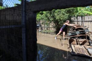 Waters recede in Bali after floods kill 16 people, with two still missing