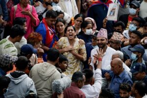 Weeping Nepalis hold funerals for those killed in deadly anti-graft protests
