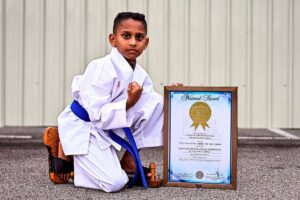 Eight-year-old boy sets MBR record with karate kata on nails