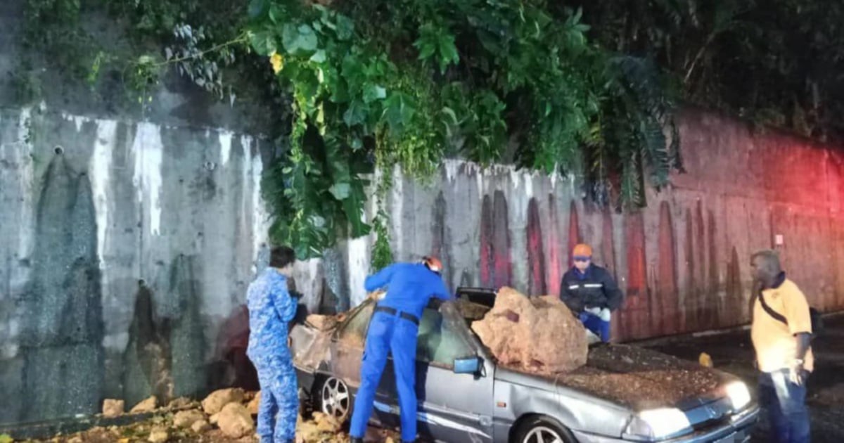 Falling boulder crushes car in Paya Terubong