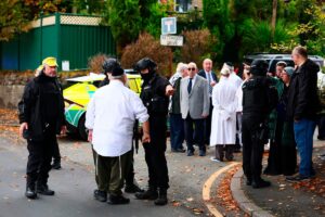 Four wounded, suspect shot in Manchester synagogue attack