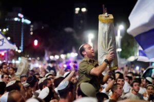 Hamas hands over hostage bodies after Israel threatens aid cut