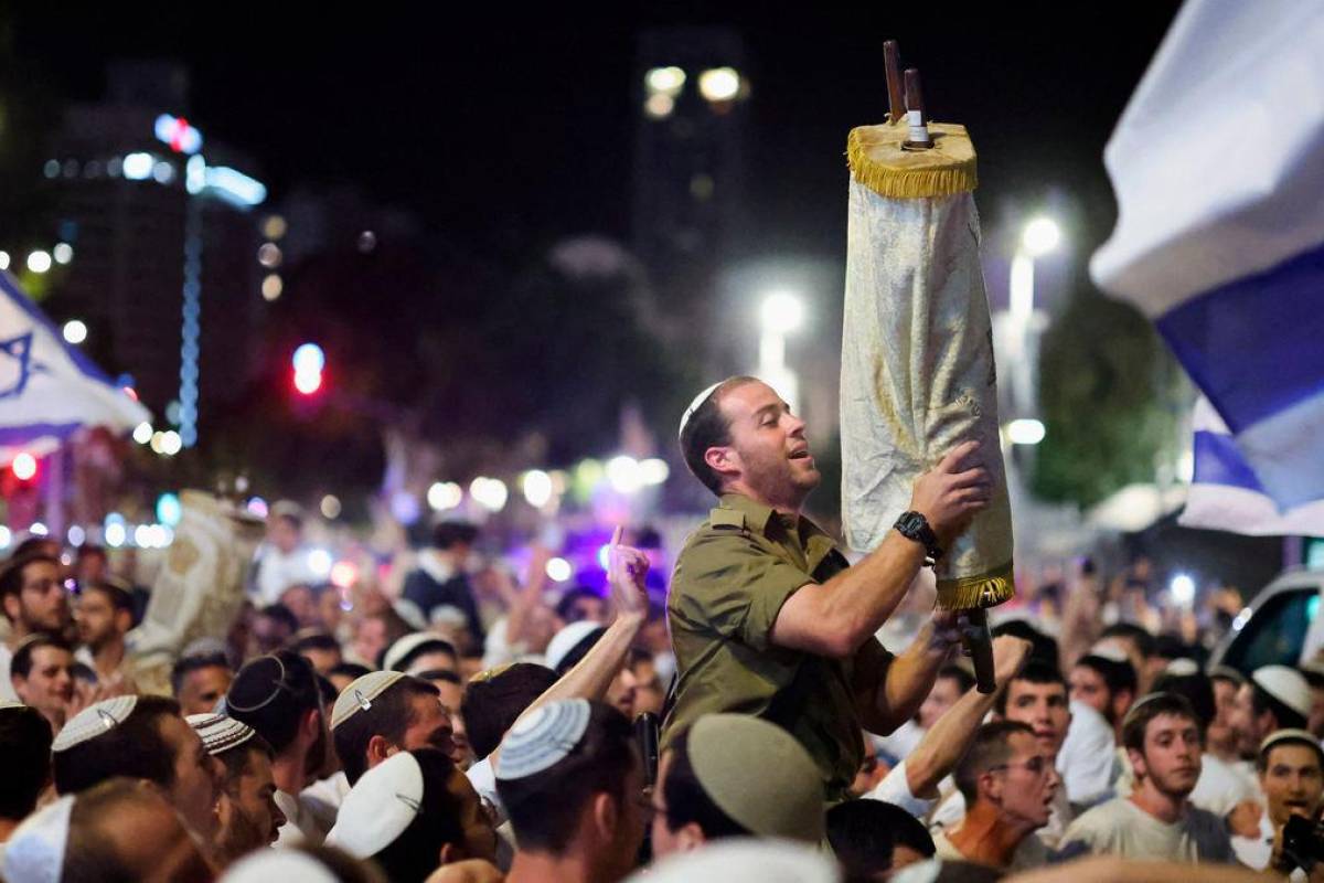 Hamas hands over hostage bodies after Israel threatens aid cut