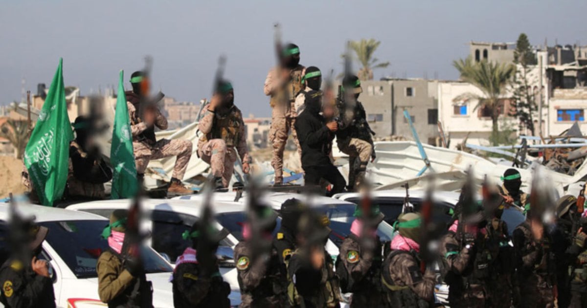 Hamas says postponing hostage body handover due to Israeli truce 'violations'