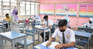 Mask up in school, urges minister after flu outbreaks