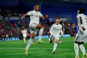 Mbappe sends Real Madrid top as Getafe self-destruct with two red cards
