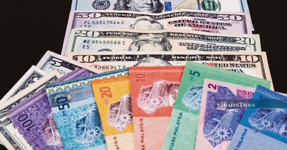 Ringgit opens flat against greenback as markets digest Fed's rate cut