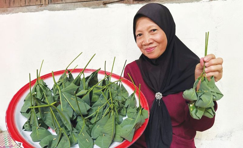 Tapai pulut daun getah masih digemari