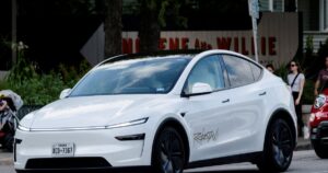 Tesla profits tumble on higher costs, tariff drag