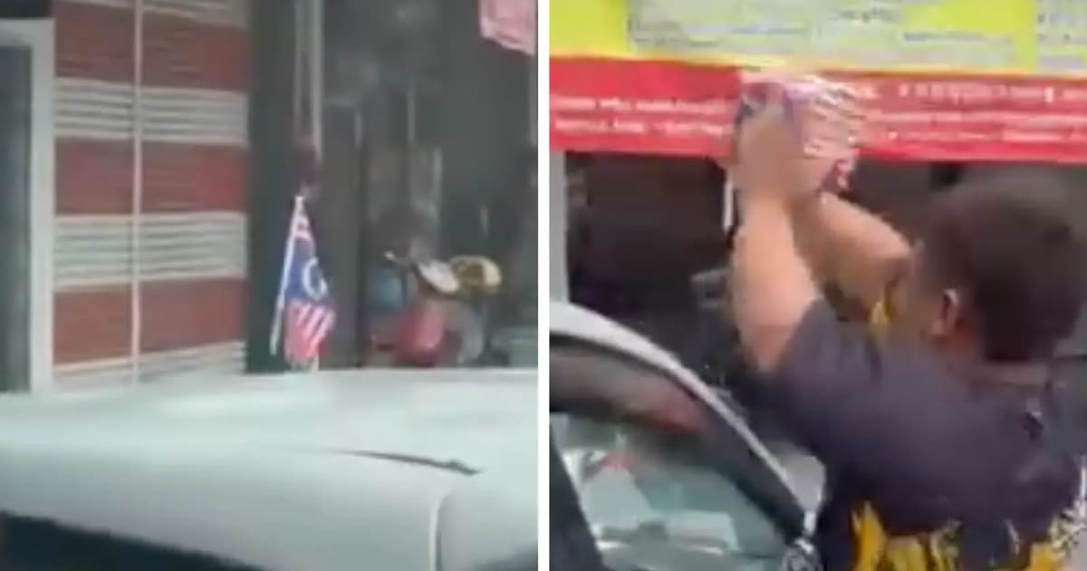 Upside-down national flag on car draws police attention
