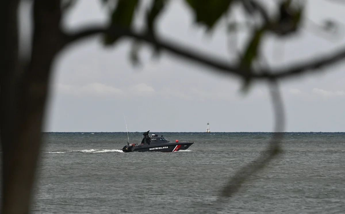 21 dead, search expands for missing