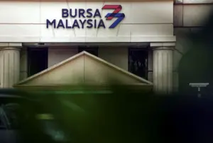 Bursa Malaysia gains for third day as ringgit strengthens