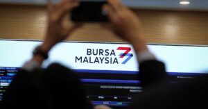 Bursa Malaysia remains lower at midday amid regional sell-off