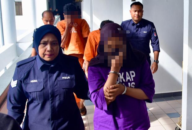 Couple remanded in probe into abuse of adopted son