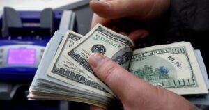 Dollar at three-month high as traders pare near-term rate cut wagers