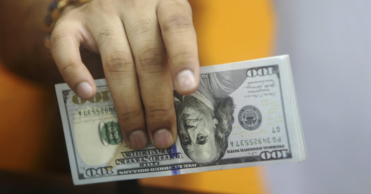 Dollar flirts with three-month peak as investors look to US data releases