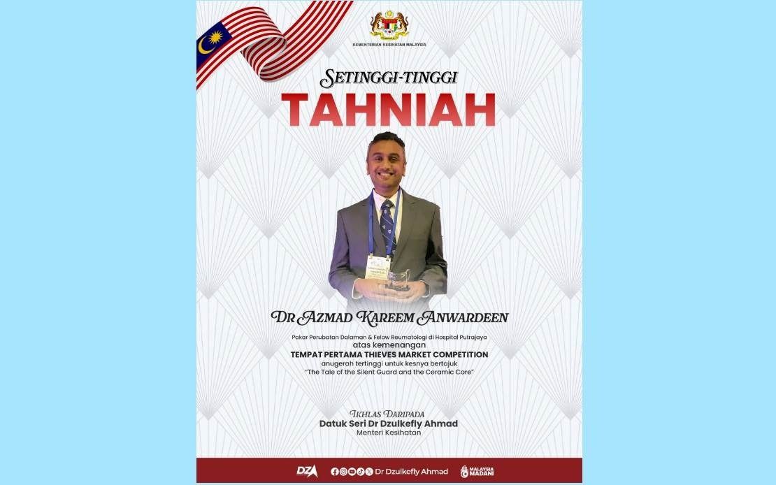 Dzulkefly congratulates Dr Azmad Kareem, first-place winner of Thieves Market Competition