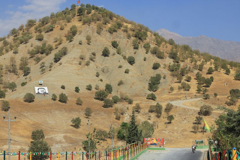 Exclusive-Turkey preparing law to let PKK fighters return under peace plan