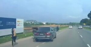 Fearing assault, woman jumps from husband's moving car