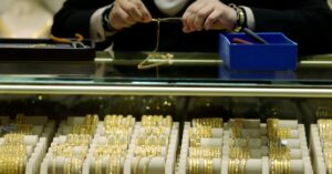 Gold gains with traders awaiting US data for fresh Fed cues