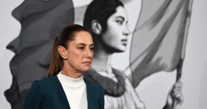 Man grabs Mexico's president and tries to kiss her during walkabout