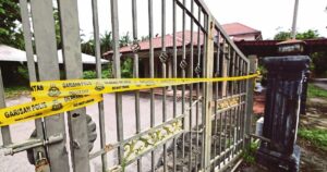 Body in a bag: Suspect returned 'to clean' house where body found