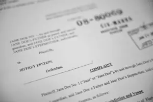 First batch of heavily redacted Epstein documents released by US Justice Department