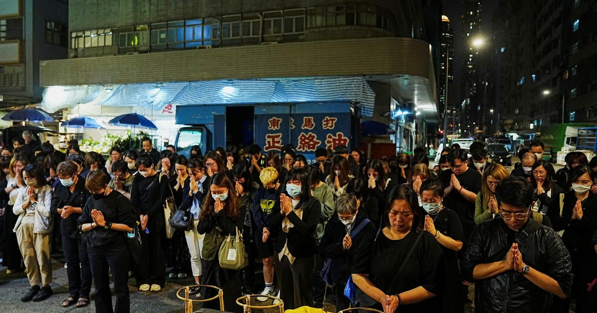 Hong Kong orders judge-led inquiry into fire that killed 156