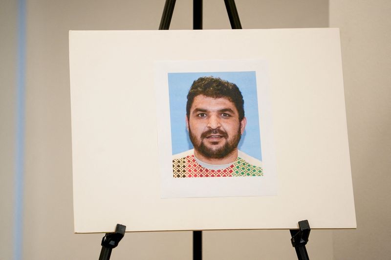 National Guard shooting suspect radicalized in US, homeland secretary says