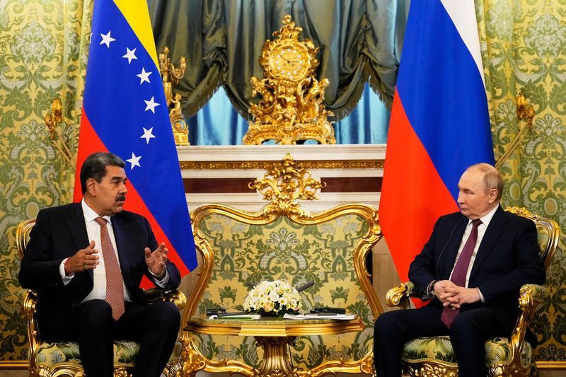 Putin calls Maduro, Lukashenko meets Venezuela envoy as Trump cranks up pressure