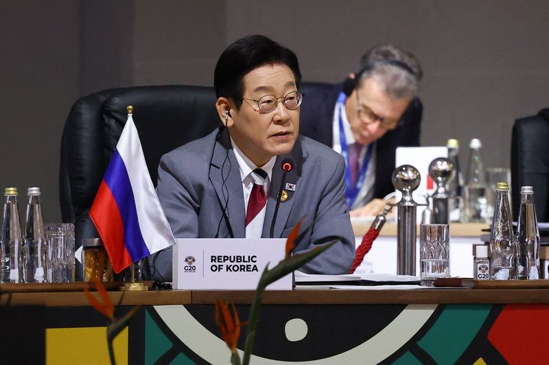 South Korea's Lee says clean-up after martial law not yet complete, in one-year address