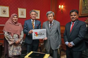 Sultan of Selangor receives coffee table book published by Bernama