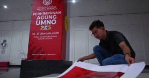 Beyond the motions: Unity govt status still dominates chatter at Umno assembly