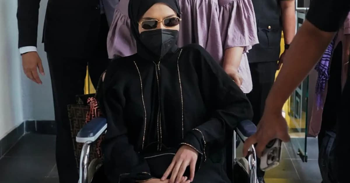 Ex-army chief’s wife charged with receiving RM5,000 from unlawful activities