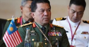 Ex-military intelligence chief claims trial to graft charges