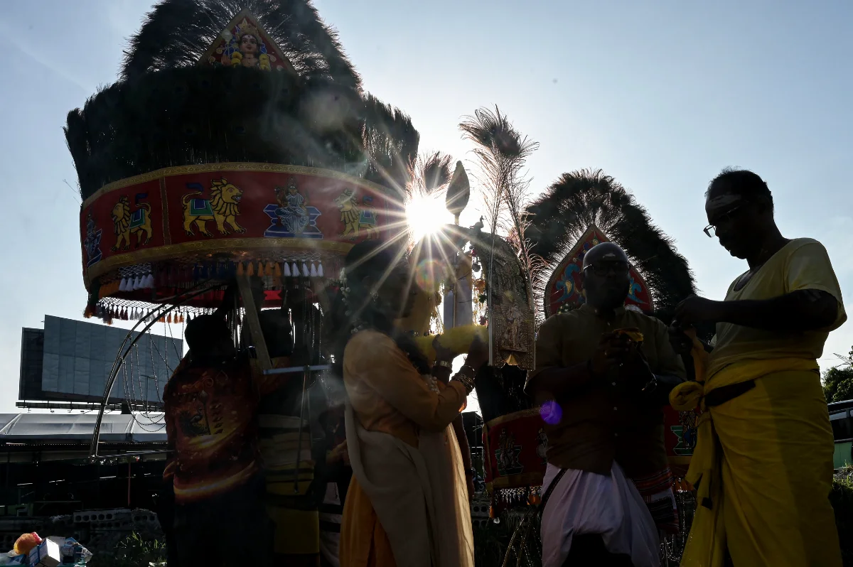 Foreign tourists captivated by early Thaipusam preparations at Batu Caves