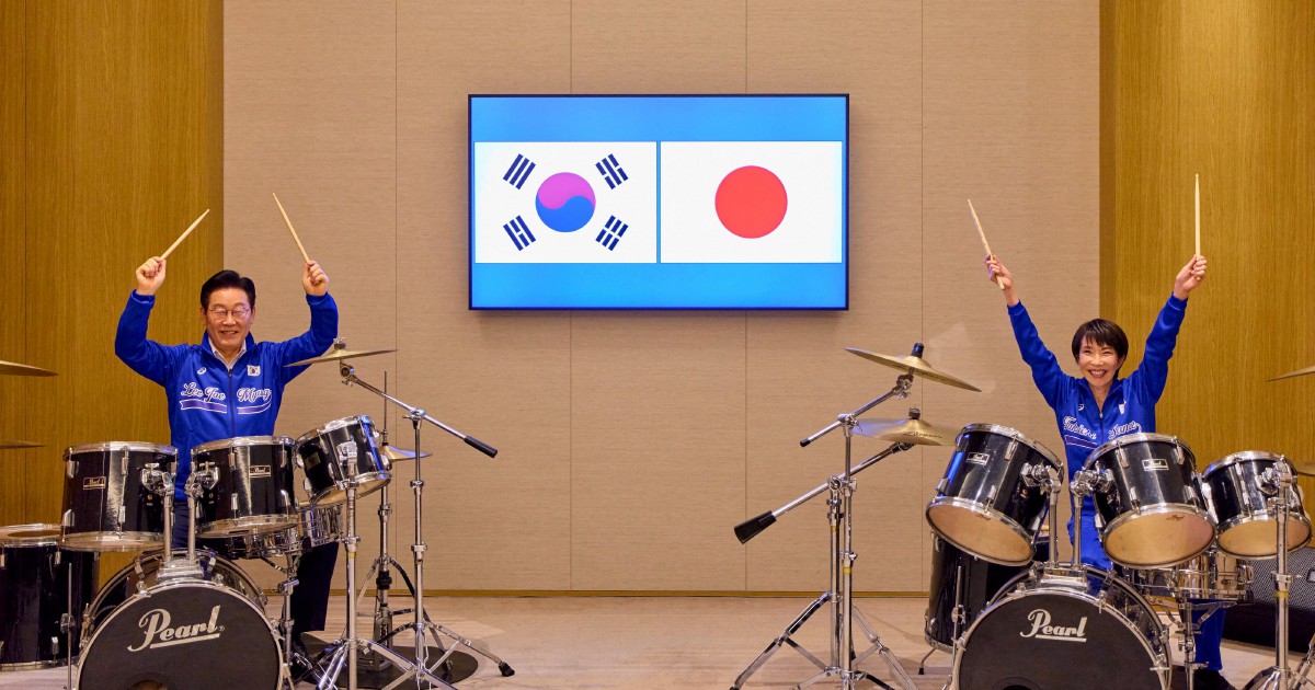Japan, South Korea leaders drum up viral moment with K-pop jam