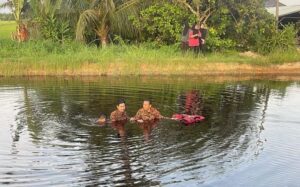 One dead, another injured after car plunges into pond