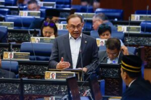 Step up or step out, Anwar tells enforcement officers in fight against corruption