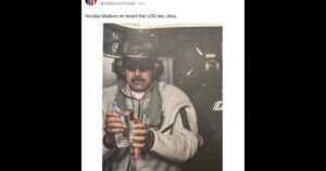 Trump posts photo of handcuffed, blindfolded Maduro