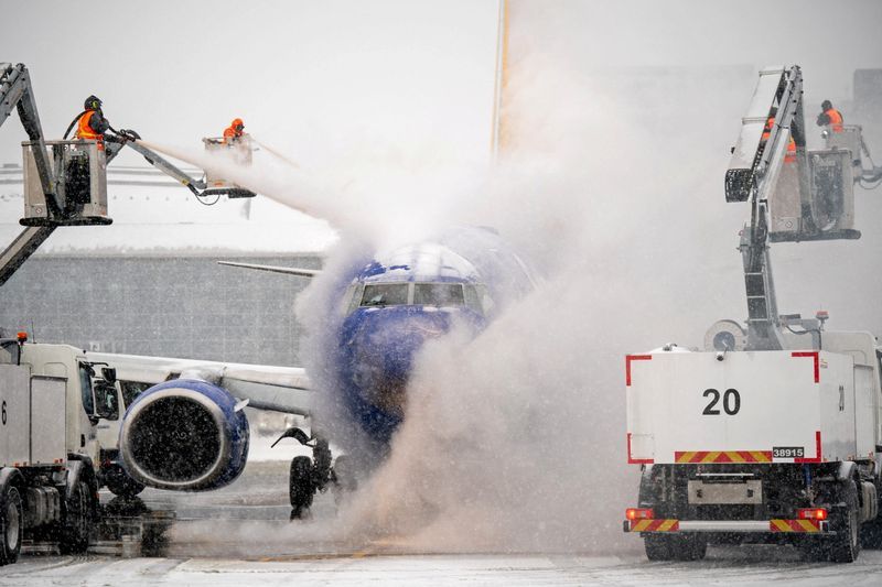 US storm leaves 217,000 without power, forces thousands of flight cancellations