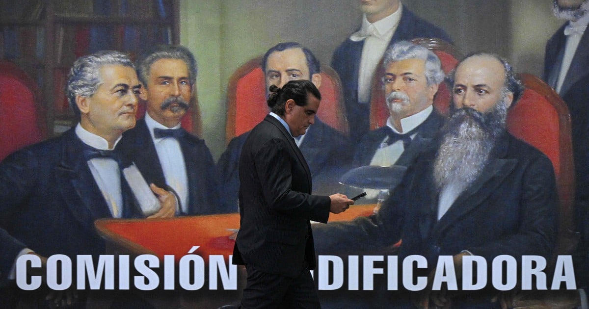 Venezuela interim leader sacks industry minister, a Maduro ally