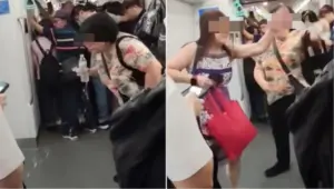Woman spits water all over SG MRT, passenger intervenes
