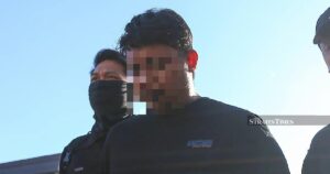 Man arrested within 24 hours over murder of bank executive