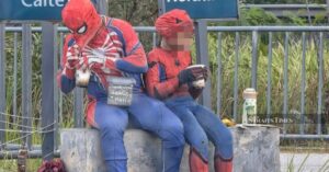 Man caught using niece in Spiderman costume to beg