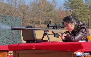 North Korean leader presents new sniper rifles to party officials