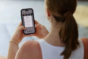 Heavy social media usage erodes young people's wellbeing, report finds