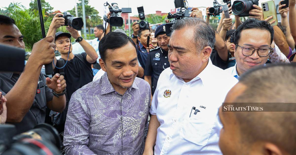 All smiles as Onn Hafiz, Loke finally meet after social media sparring