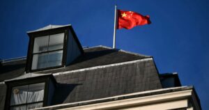 China makes new push to take yuan global, vows vigilance against financial risks